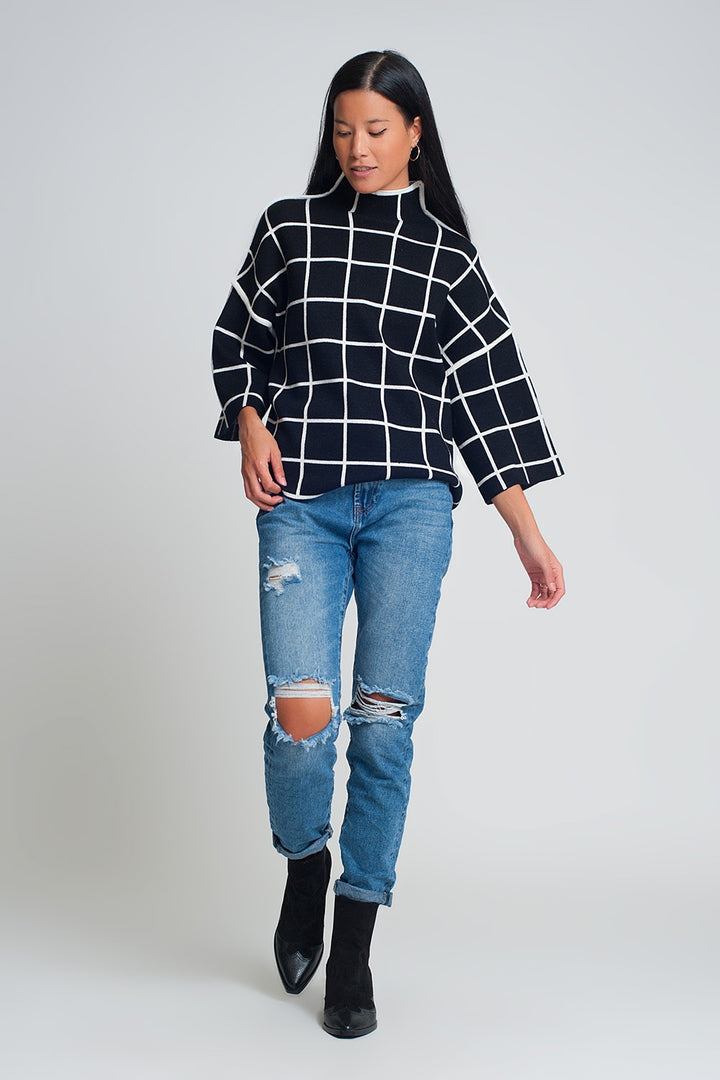 Black sweater with checkered print in 3/4 sleeve and high neck