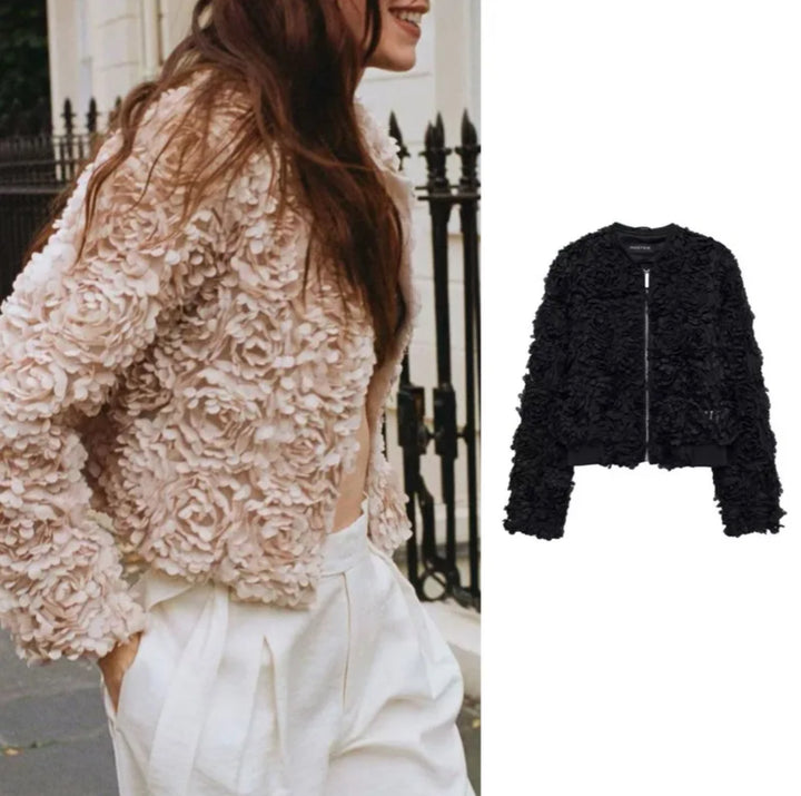 Black bomber jacket with soft petal embellishment