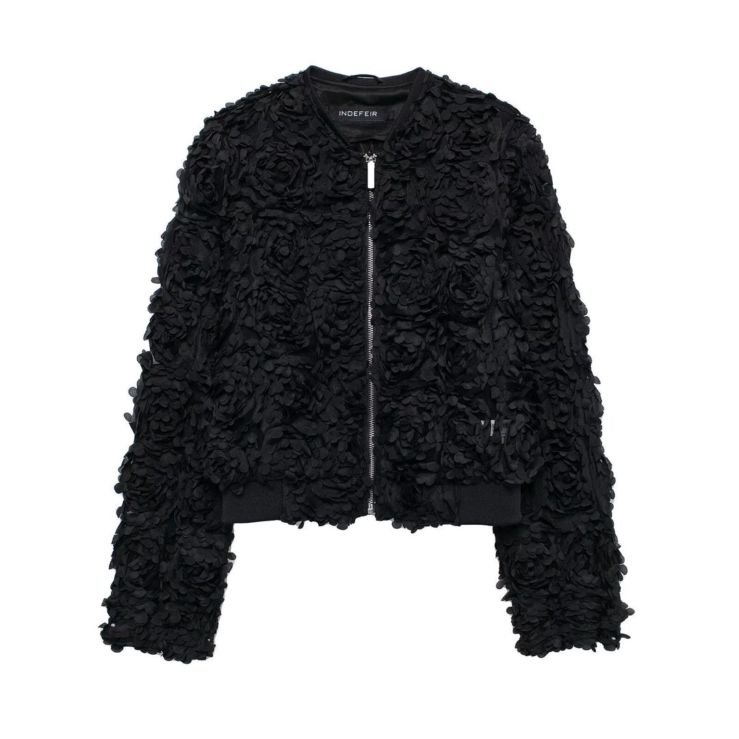 Black bomber jacket with soft petal embellishment