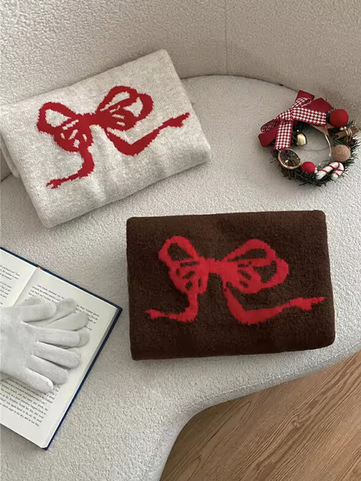 Charming Oversized Sweater with Red Bow Design