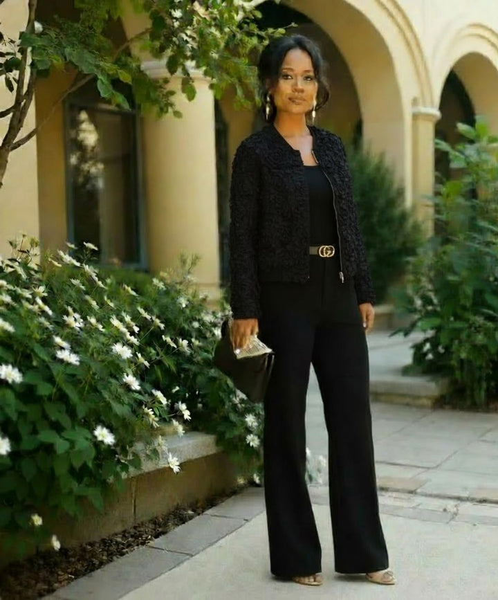 Black bomber jacket with soft petal embellishment